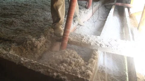 Thermal insulation with cellulose. Spraying in the attic, house ceiling Stock Footage 144737910