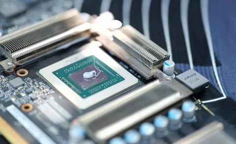 Thermal paste lying on processor from video card closeup Stock Photos