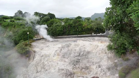 Thermal pool from volcanic lake steaming in furnas Azores Portugal slow motio 4k Stock Footage