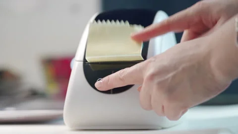 Thermal shipping barcode label printer printing labels Stock Footage 265673310