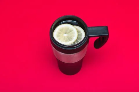 Thermo mug with tea Stock Photos