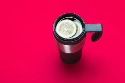Thermo mug with tea Stock Photos