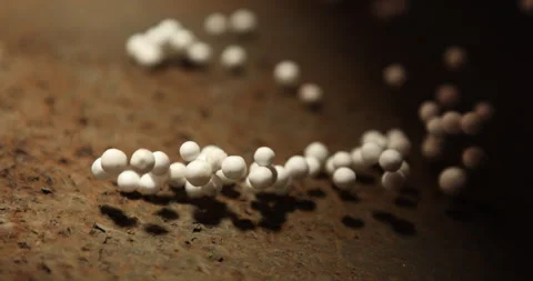 Thermocol balls stuck in spider web Stock Footage 324035070