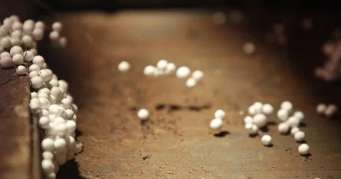 Thermocol balls stuck in spider web Stock Footage 324035173