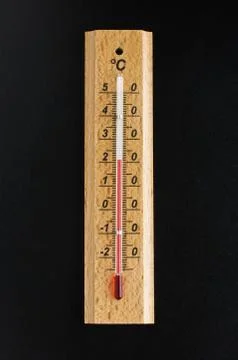 Thermometer on the black background Foto stock