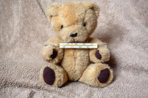 A thermometer in the hands Stock Photos