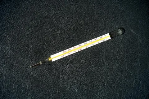 Thermometer isolated on black background Stock Photos