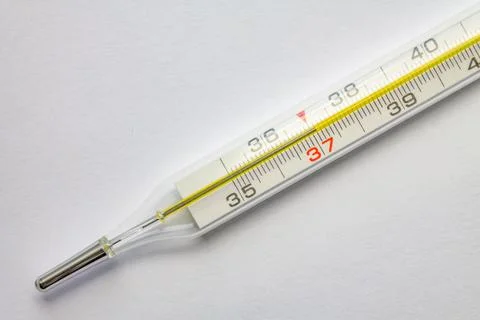 Thermometer isolated on the white background Medical thermometer shows the te Stock Photos