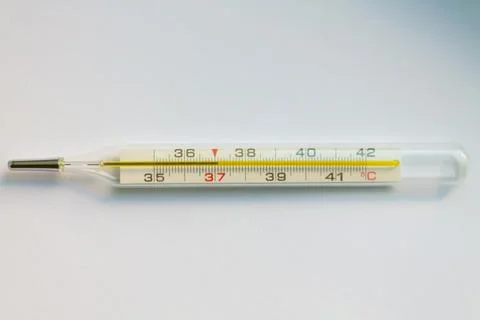 Thermometer isolated on the white background Medical thermometer shows the te Stock Photos