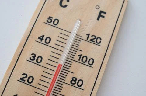 Thermometer on light surface. Stock Photos