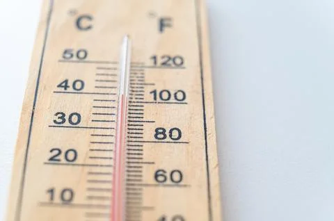 Thermometer on light surface. Stock Photos