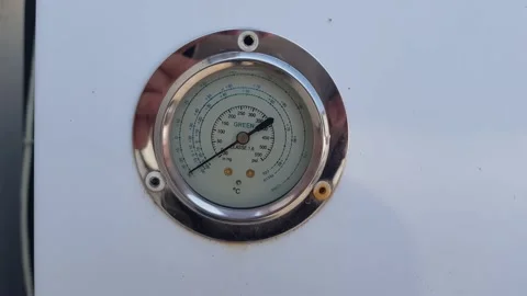 Thermometer with the pointer of a large cooling device Stock Footage 226350276