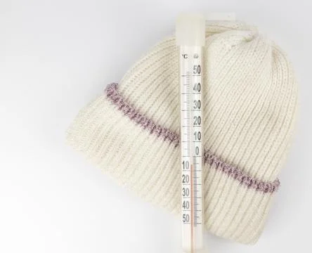 A thermometer showing the sub-zero temperature outside in celsius on a child's 库存照片