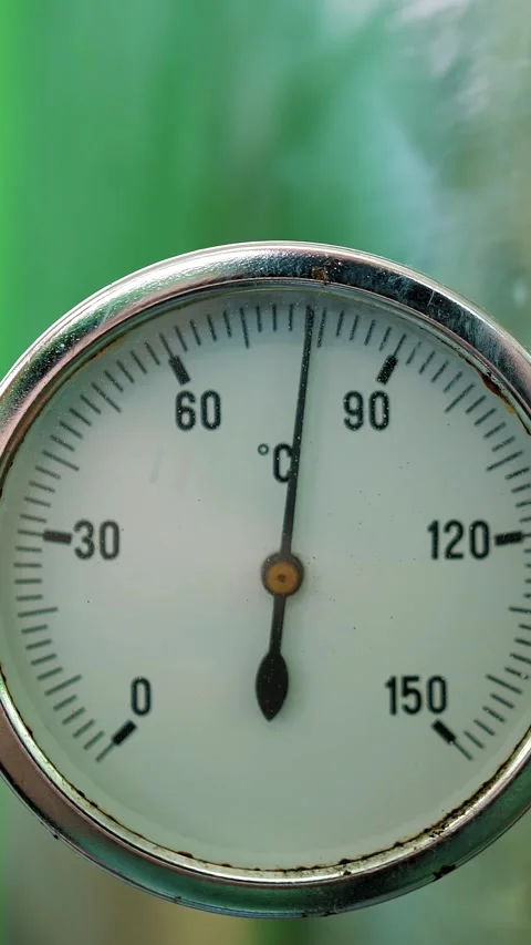 A thermometer is showing a temperature of 150 degrees. The thermometer is white Stock Footage 316467723