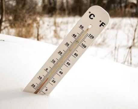 Thermometer in the snow Stock Photos