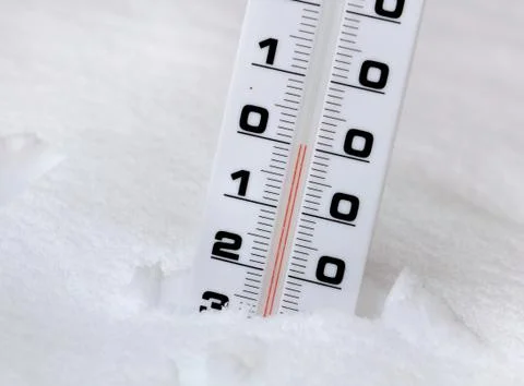 Thermometer in the snow Stock-Fotos