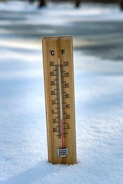 Thermometer on snow Foto stock