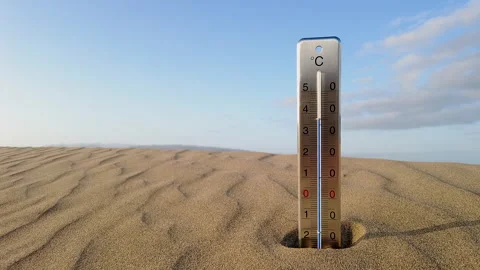 A thermometer stands in the hot sand of a dune. Stock Footage 264803170