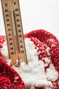 Thermometer with sub zero temperature sticks out Stock Photos