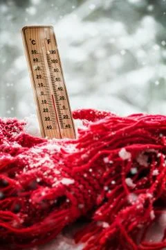 Thermometer with sub zero temperature sticks out Stock Photos