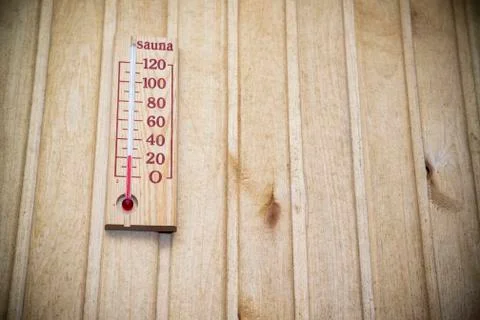 Thermometer on wall of sauna Stock Photos