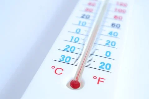 Thermometer on a White Background Stock Photos