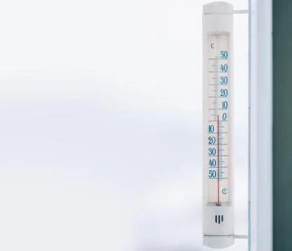 Thermometer In Window Stock Photos