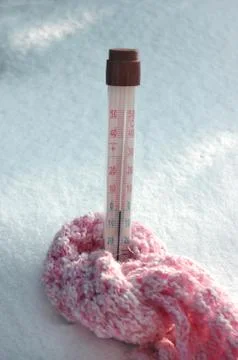 Thermometer in winter Stock Photos