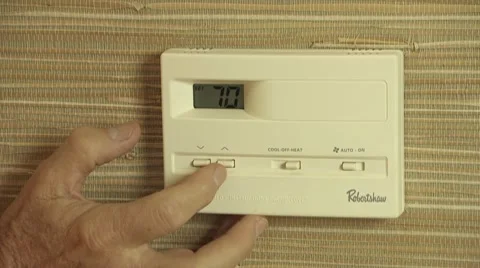 Thermostat raising temperature Stock Footage 8682086