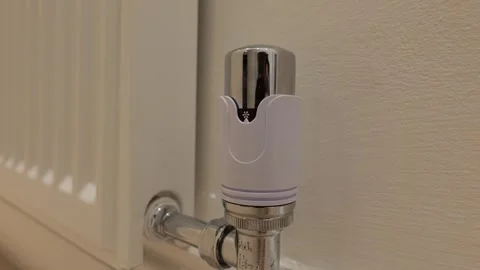 A Thermostatic Radiator Valve (TRV) is a self-regulating valve Stock Footage 337662931