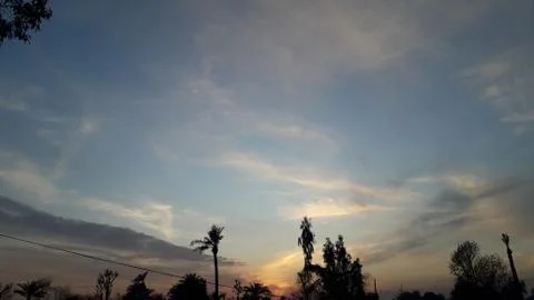 These are some clouds flying on the sky this is evening time and sun set Foto stock