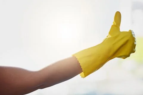 These gloves help me be more efficient. Shot of an unrecognizable woman doing Stock Photos