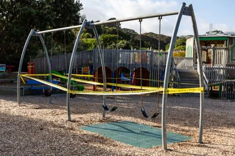 These Swings Have Been Taped Off Stock Photos