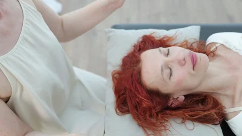 Theta healing concept. Meditation in process. Two women calming their minds Stock Footage 323915566