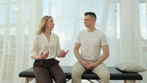 Theta healing session. Young client at a psychotherapists session during Stock Footage 323914890