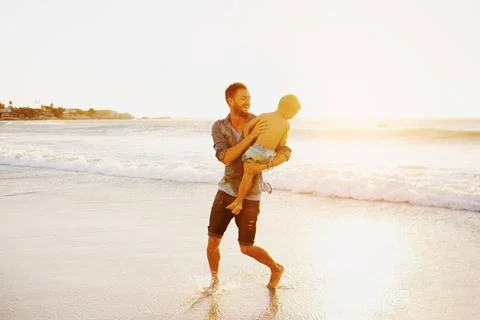 They are having waves of seaside fun Foto stock