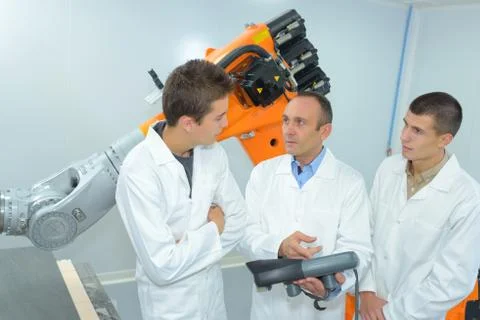 They are improving a robot Stock Photos