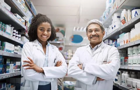 They are knowledgeable, friendly and professional. Cropped portrait of two Stock Photos