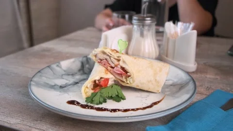 They brought a ready-made dish (tortilla) Stock Footage 164678248