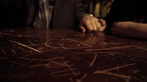 They shake hands in a pub table Stock Footage 63319858