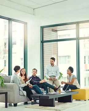 They share the same ambition to succeed. a group of colleagues having a Stockfoto's