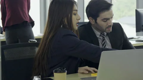 They talking about business plan or marketing plan together. Stock Footage 146774141
