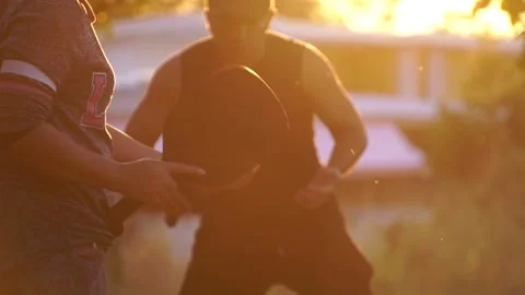 They were having fun playing pickleball at sunset Stock Footage 231041047