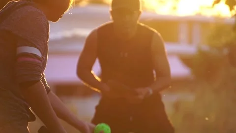 They were having fun playing pickleball at sunset Stock Footage 231041052