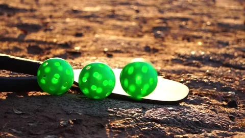 They were having fun playing pickleball at sunset Stock Footage 231041190