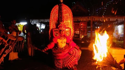 Theyyam perform with fire during temple festival in Kerala, India Stock Footage 125240573