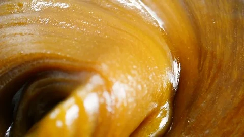 Thick aromatic brown honey Stock Footage 80819208