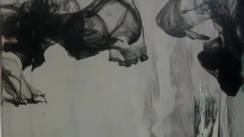 Thick black ink falling down in clear water on grey background Stock Footage 291109744