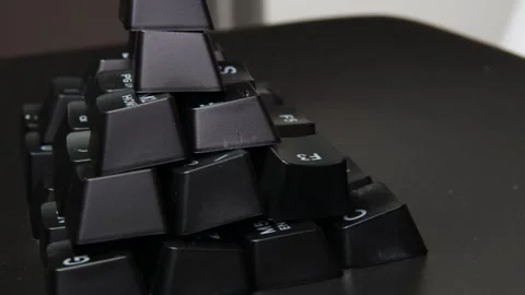 The thick black mechanical keyboard key black surface rotates 360 degrees Stock Footage 250975969