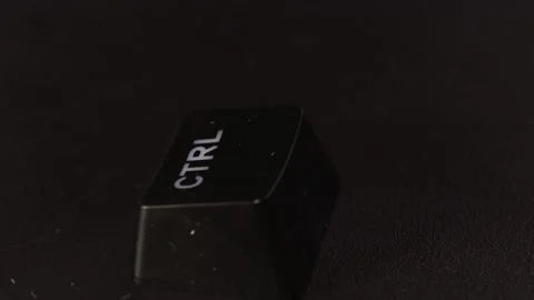 The thick black mechanical keyboard key black surface rotates 360 degrees Stock Footage 250976525